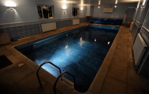 The indoor heated pool at night